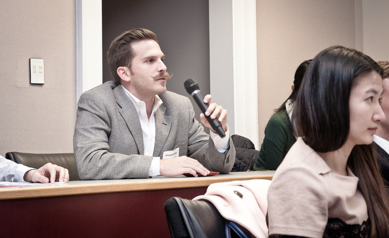 Darden student Fernando Davila (MBA '15 and current President of the Darden Latin American Student Association) asks a question during one of the  interactive conference sessions. 