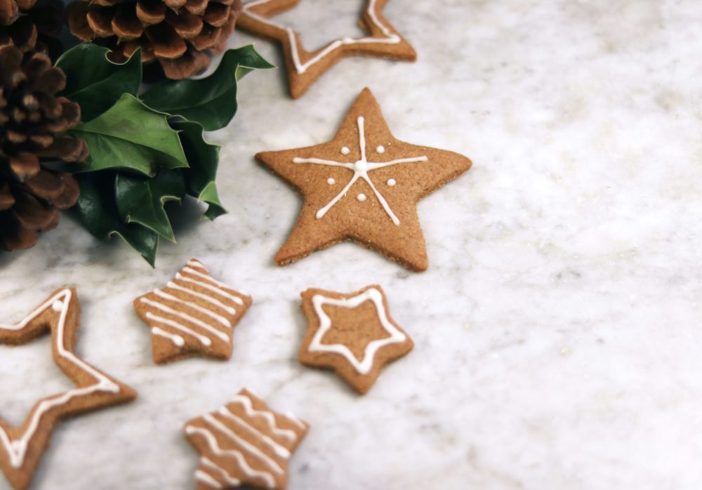 Star-shaped gingerbread cookies with frosting