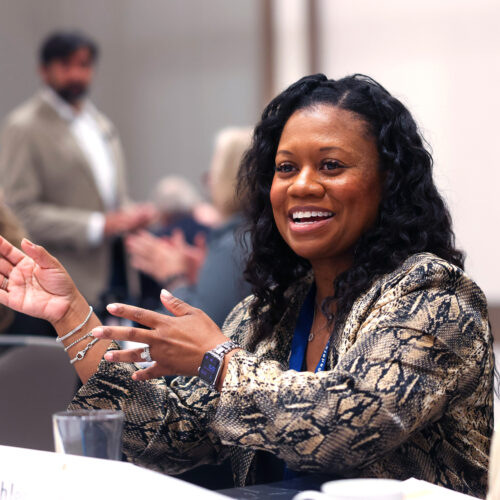 Participant speaking to class