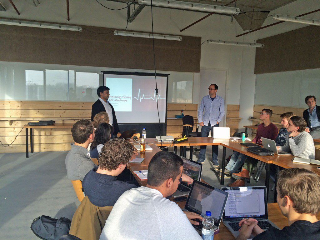During their onsite visit to Amsterdam, a GFE team had a chance to share their knowledge with a group of young entrepreneurs. This photo shows Rafael Barbosa (MBA '15) and Vaibhav Laddha (MBA '15) presenting. 