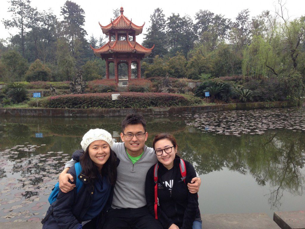 Darden Class of 2015 students Yichen Feng, Seyitbek Usmanov, and Lydia Kim on Sichuan University grounds in Chengdu. 